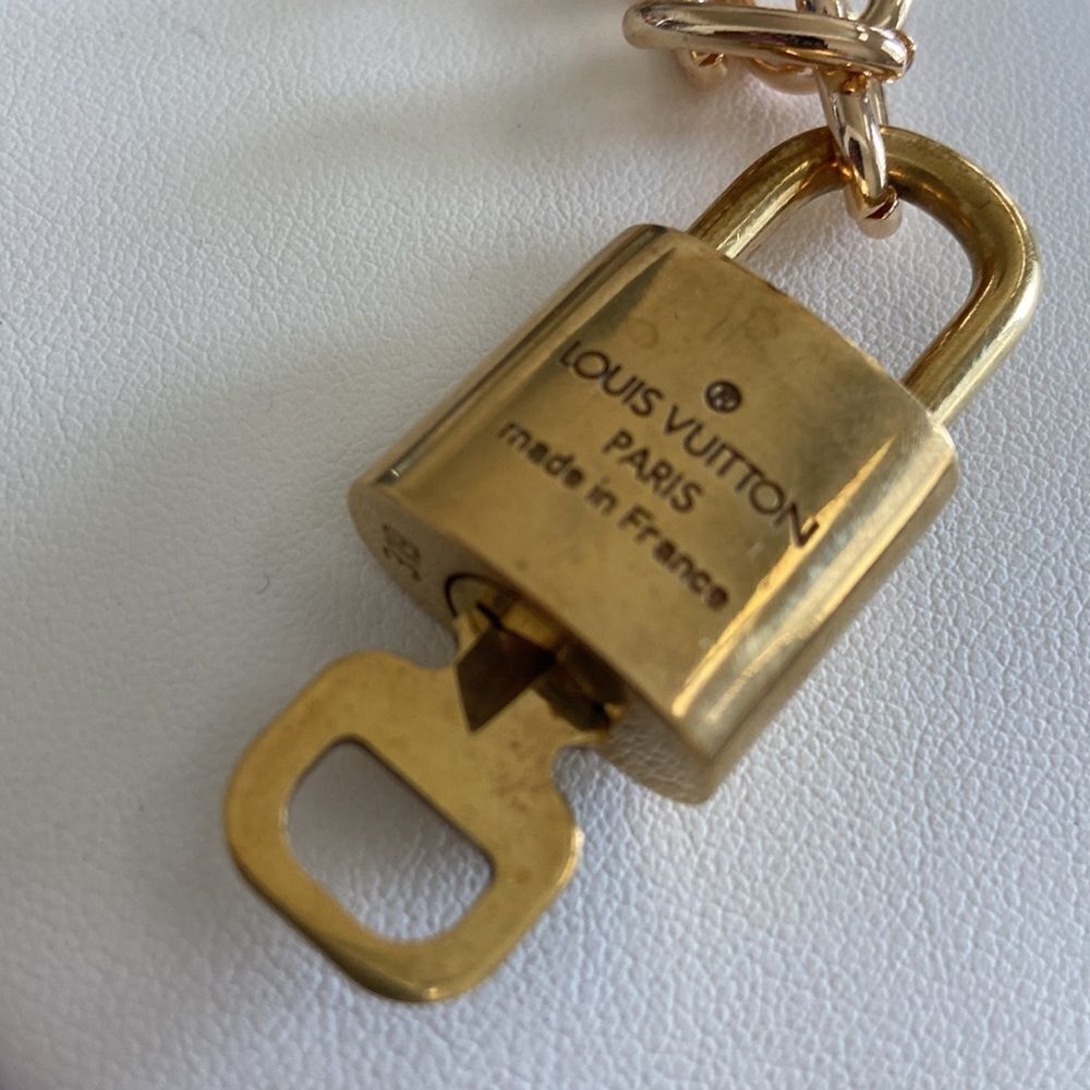 LV key lock with key 100% authentic with NWT necklace - Picture 8 of 9